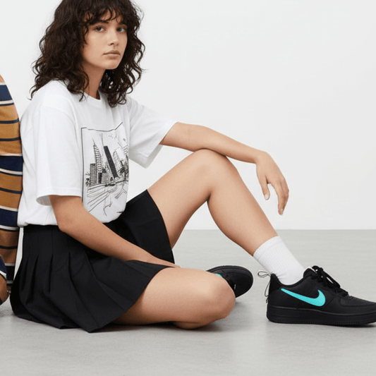 Air Force 1 Low negro y azul celeste TM